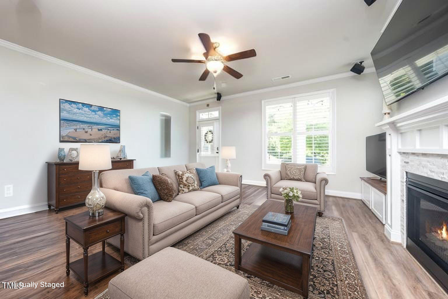 1705 Main Divide Drive Wake Forest, NC 27587 - Photo 11 of 47 a living room with furniture a fireplace and a window