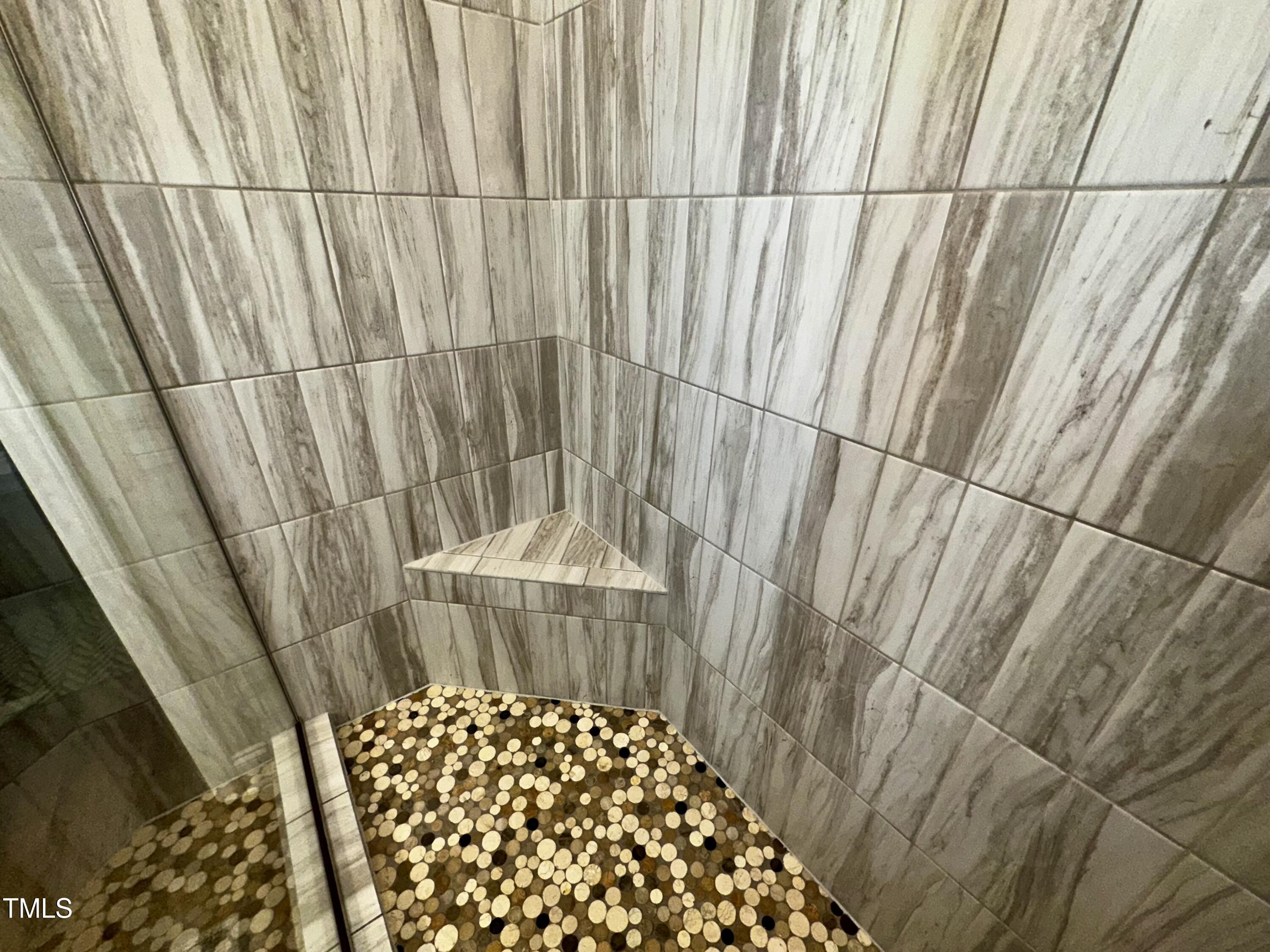 1705 Main Divide Drive Wake Forest, NC 27587 - Photo 22 of 47 a bathroom with a shower