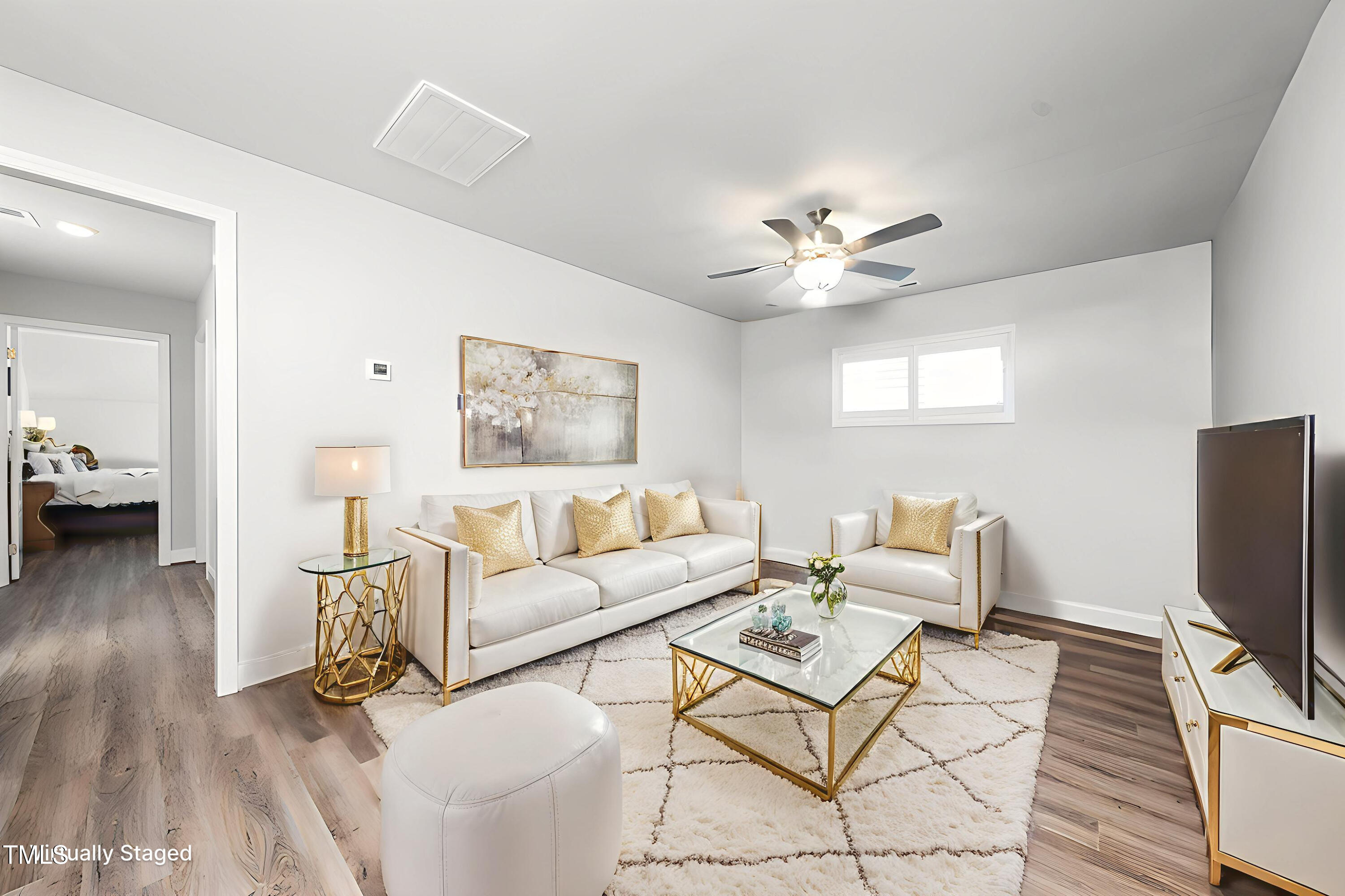 1705 Main Divide Drive Wake Forest, NC 27587 - Photo 27 of 47 a living room with furniture and a flat screen tv