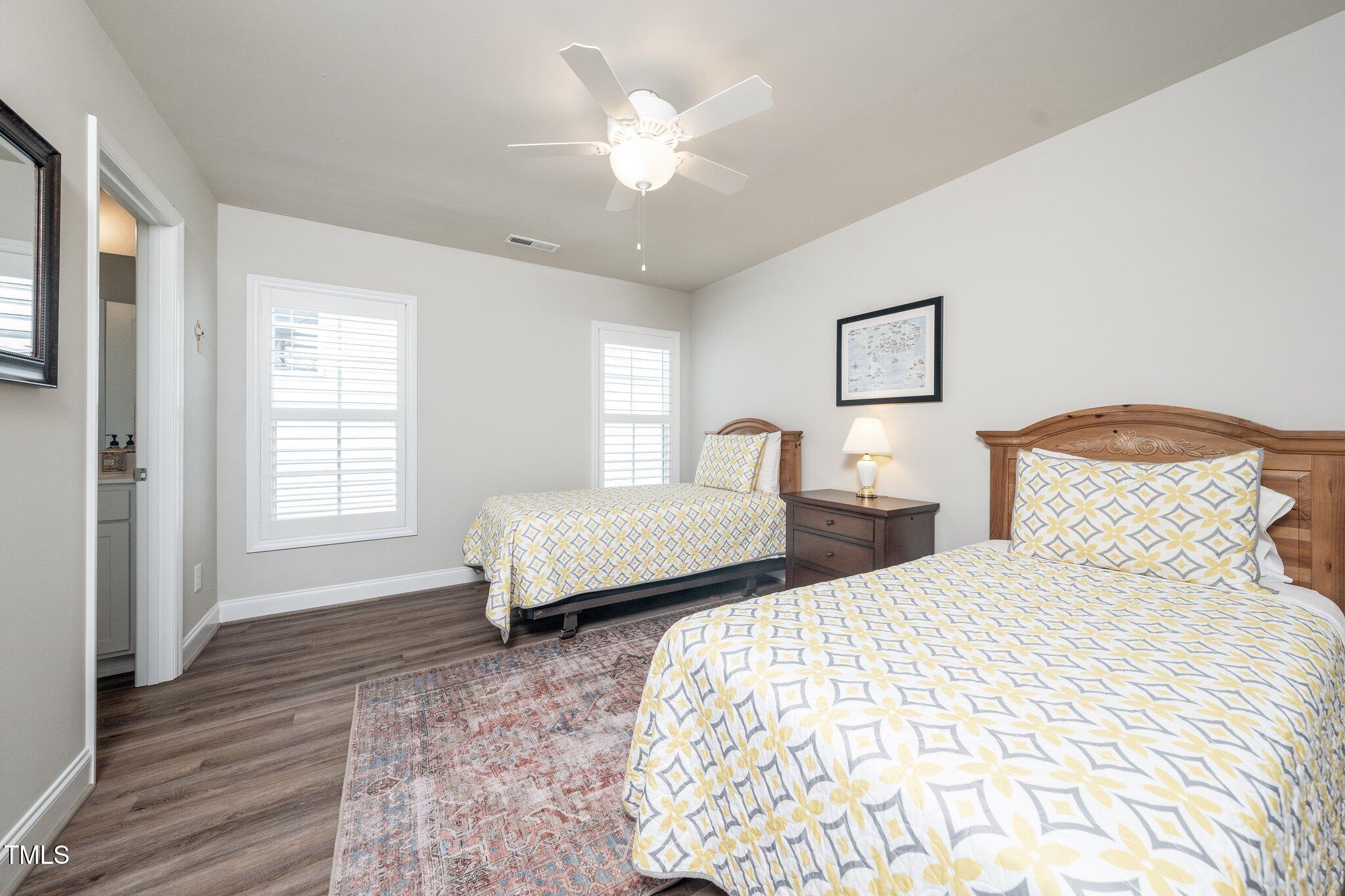 1705 Main Divide Drive Wake Forest, NC 27587 - Photo 28 of 47 a bedroom with double bed and a large window