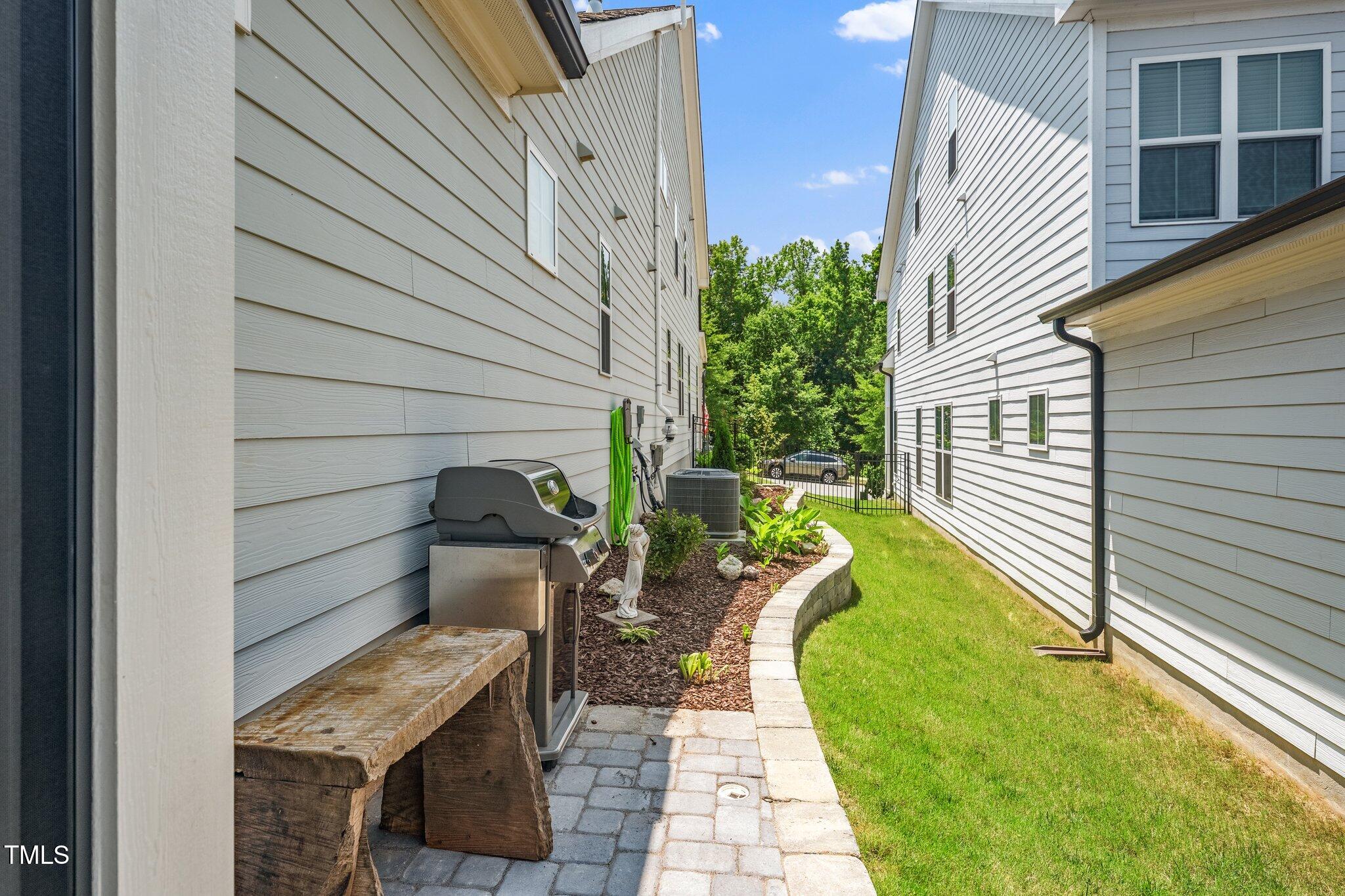 1705 Main Divide Drive Wake Forest, NC 27587 - Photo 36 of 47 a view of a chair and tables in the balcony