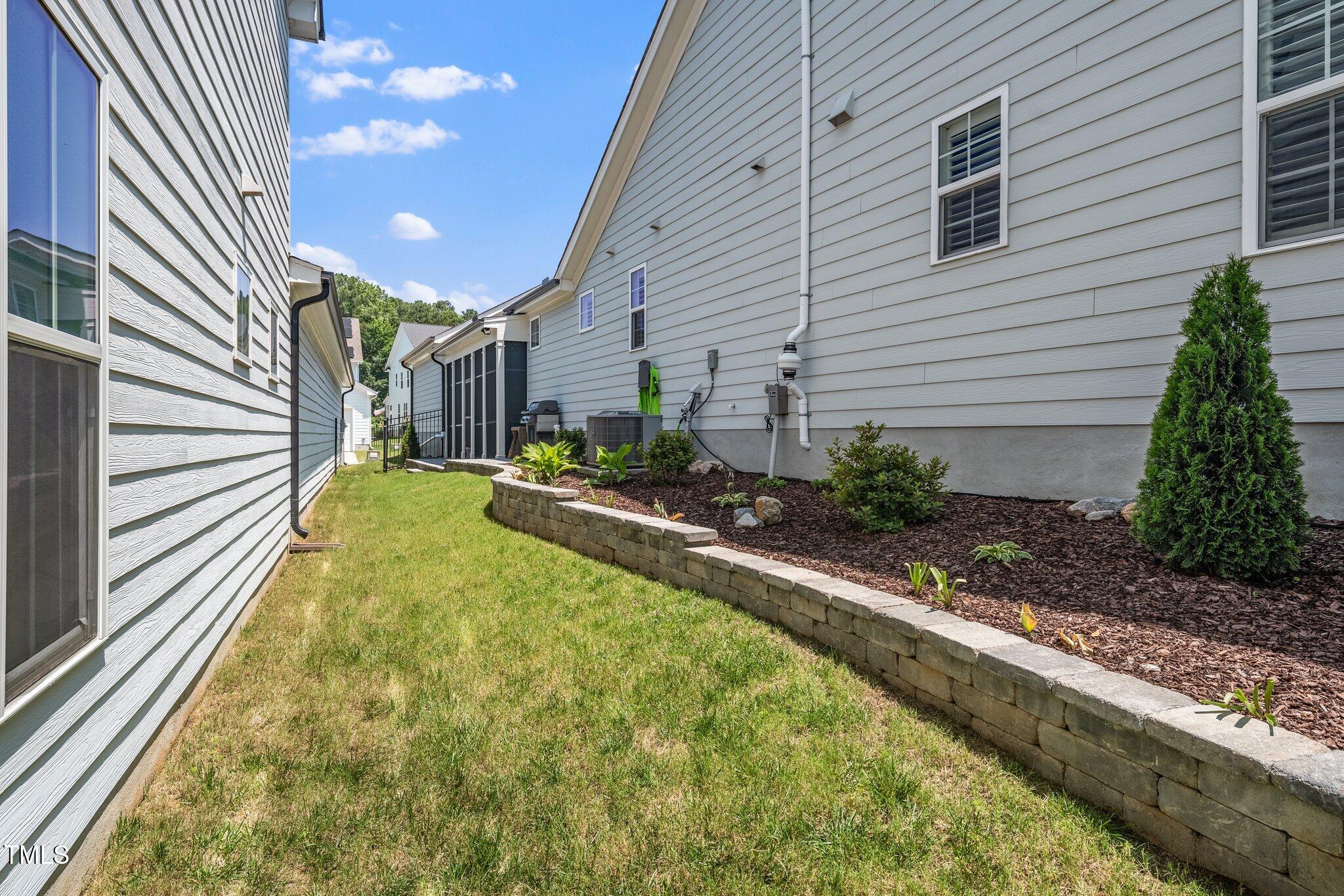 1705 Main Divide Drive Wake Forest, NC 27587 - Photo 37 of 47 a view of a house with backyard and sitting area