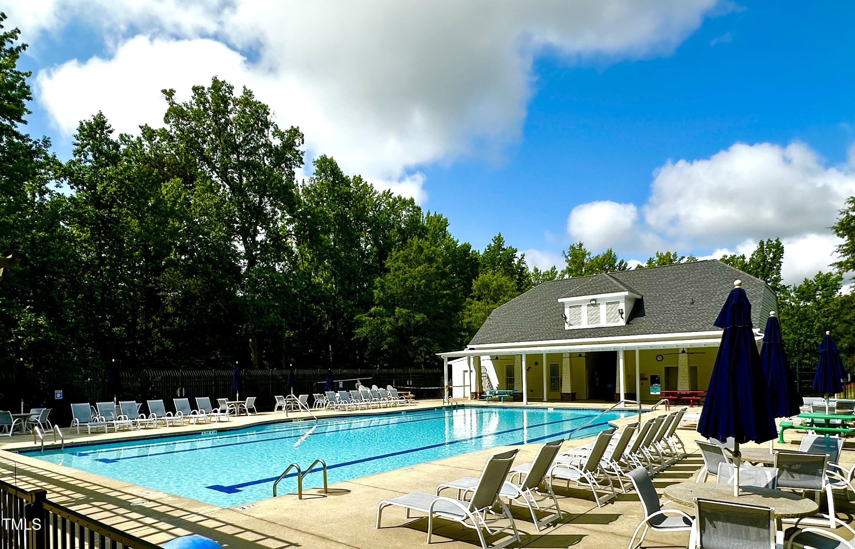 1705 Main Divide Drive Wake Forest, NC 27587 - Photo 42 of 47 a view of a house with a backyard porch and sitting area
