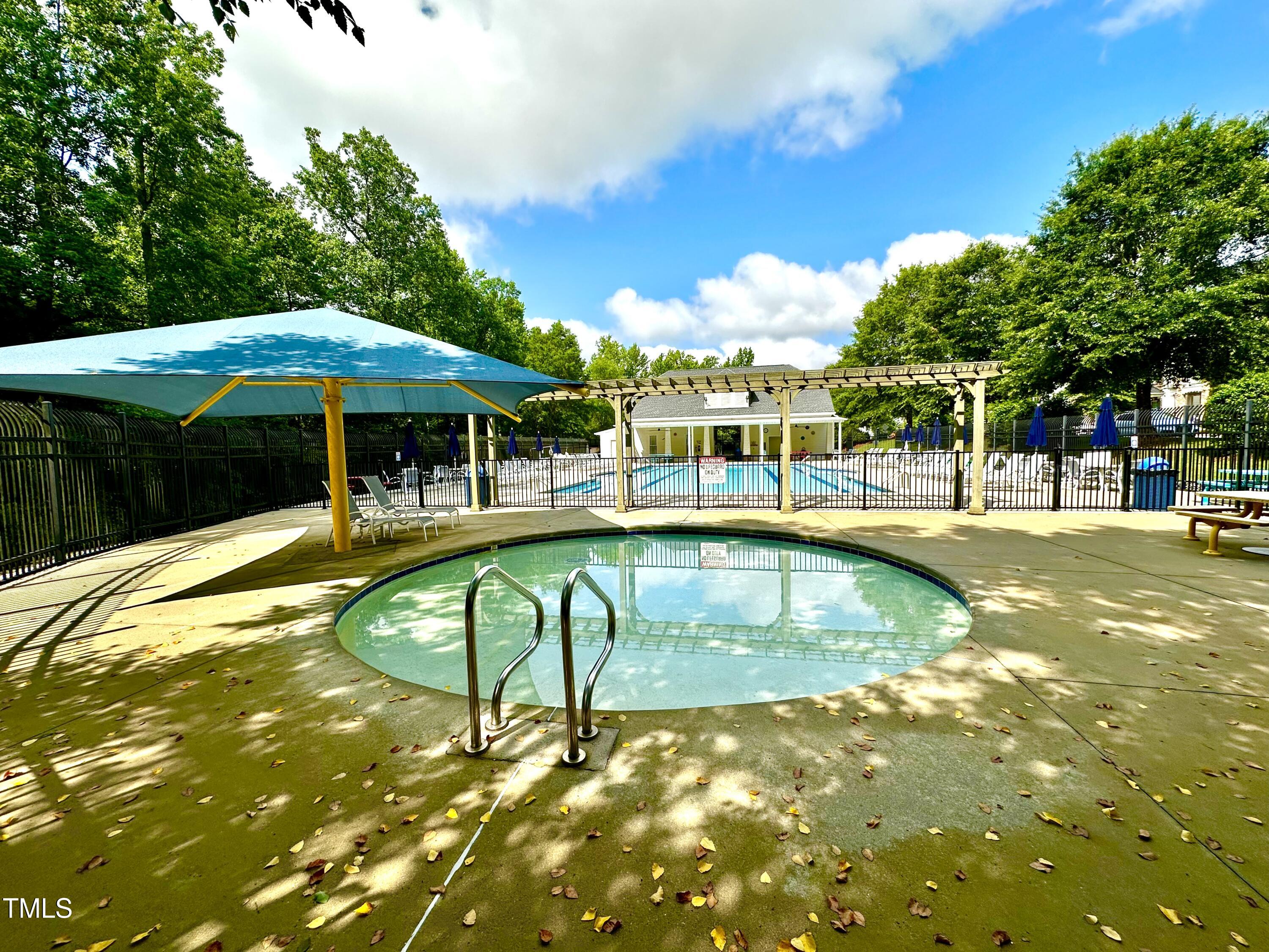 1705 Main Divide Drive Wake Forest, NC 27587 - Photo 43 of 47 a swimming pool with outdoor seating and yard