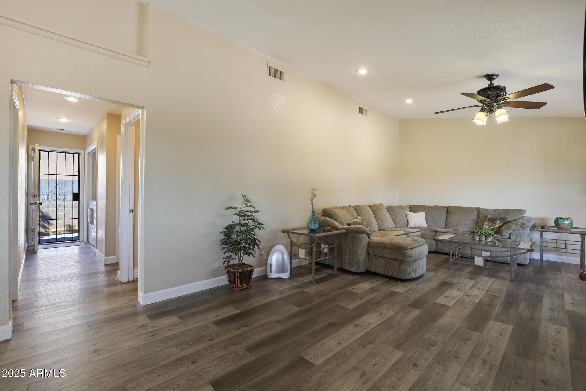 1101 North Monte Rosa Lane Payson, AZ 85541 - Photo 14 of 35 a living room with furniture and wooden floor