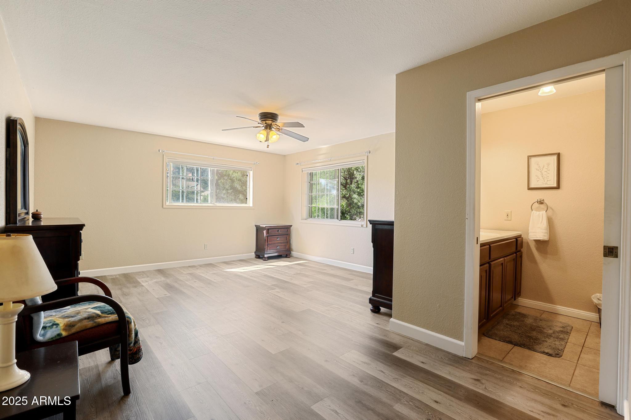 1101 North Monte Rosa Lane Payson, AZ 85541 - Photo 15 of 35 a view of a livingroom with a window and wooden floor