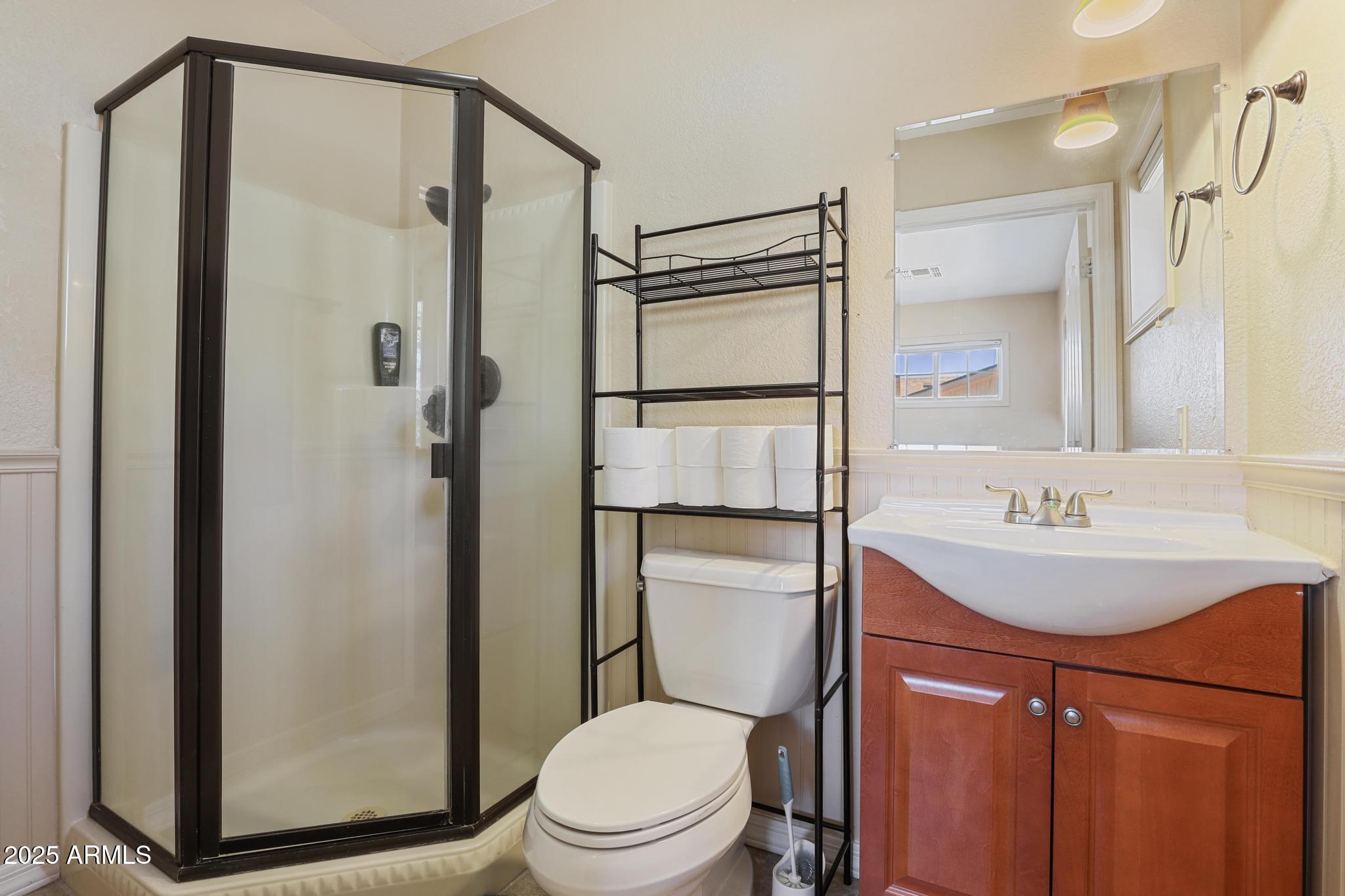 1101 North Monte Rosa Lane Payson, AZ 85541 - Photo 21 of 35 a bathroom with a granite countertop sink toilet and shower