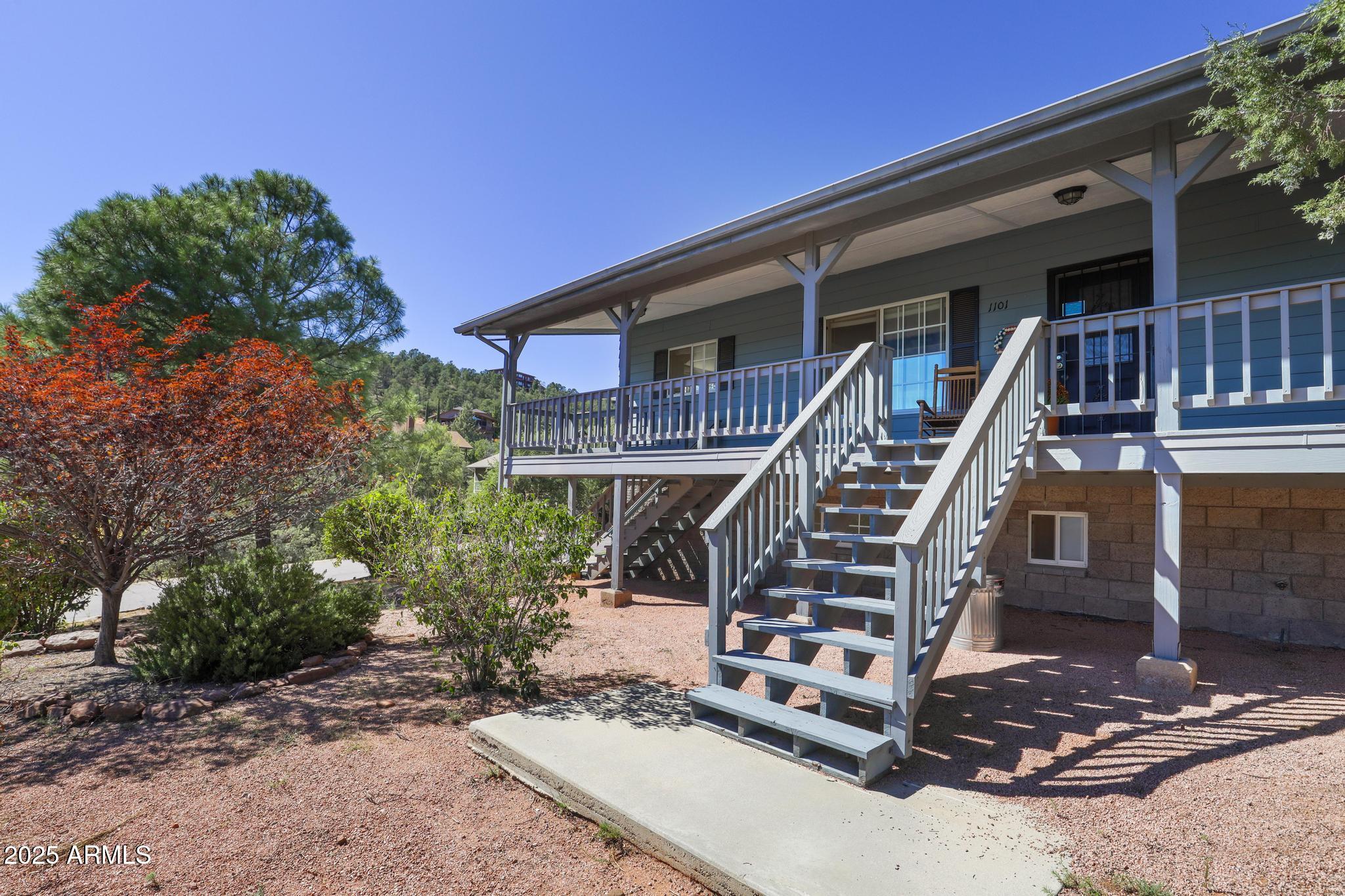 1101 North Monte Rosa Lane Payson, AZ 85541 - Photo 3 of 35 a front view of house with deck outdoor seating and green space
