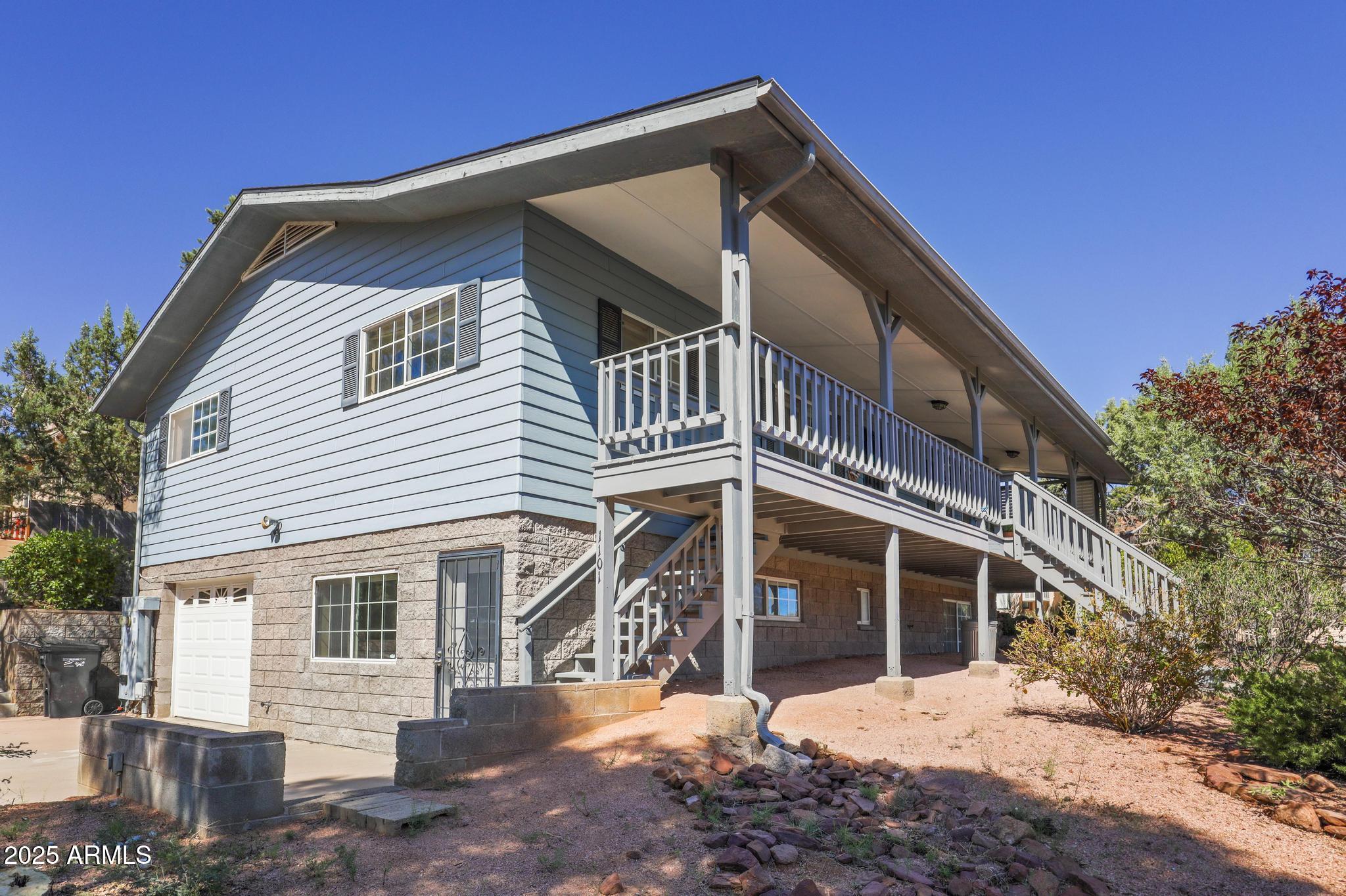 1101 North Monte Rosa Lane Payson, AZ 85541 - Photo 33 of 35 a front view of a house with a yard