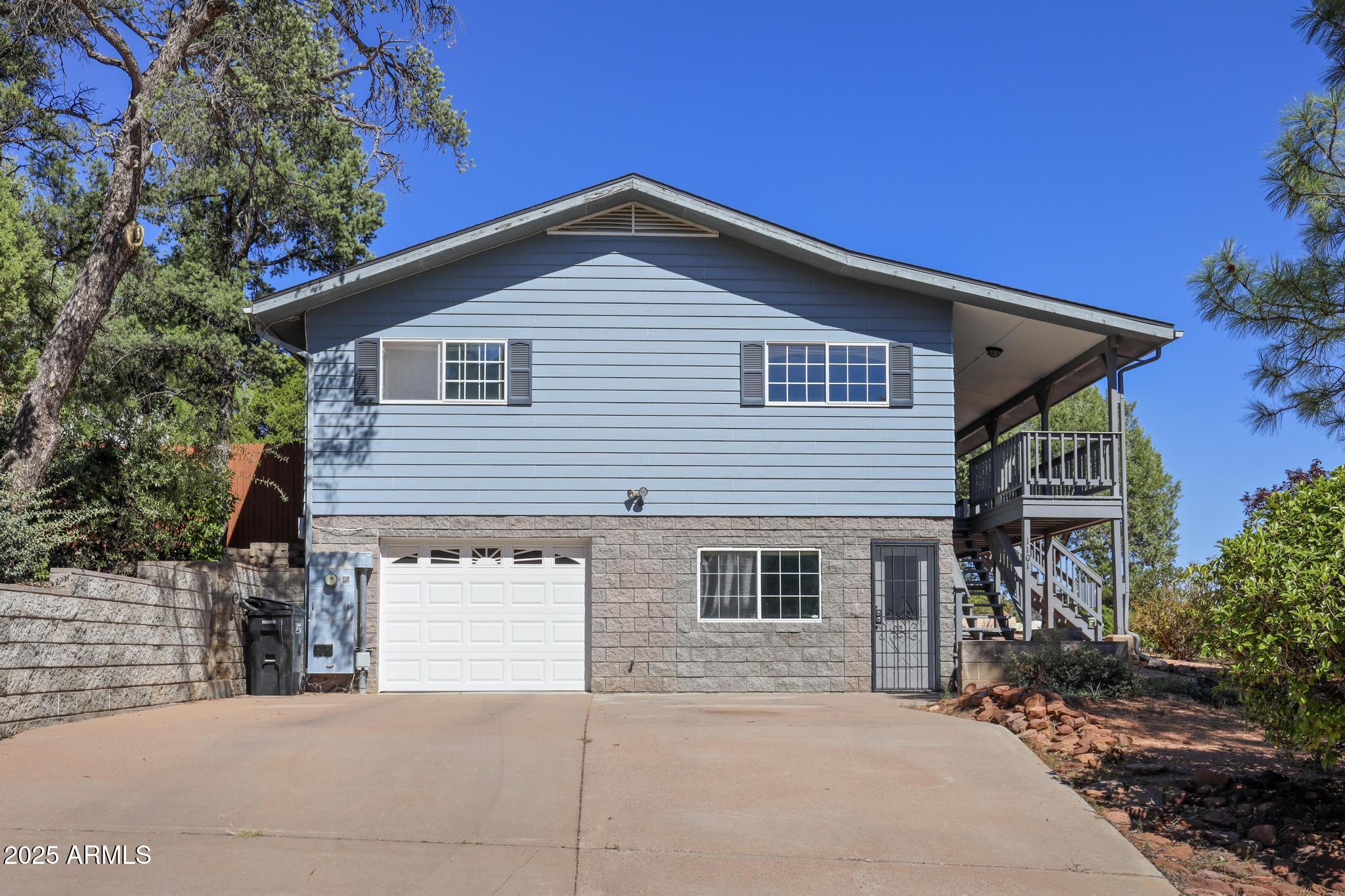 1101 North Monte Rosa Lane Payson, AZ 85541 - Photo 34 of 35 a front view of a house with garage