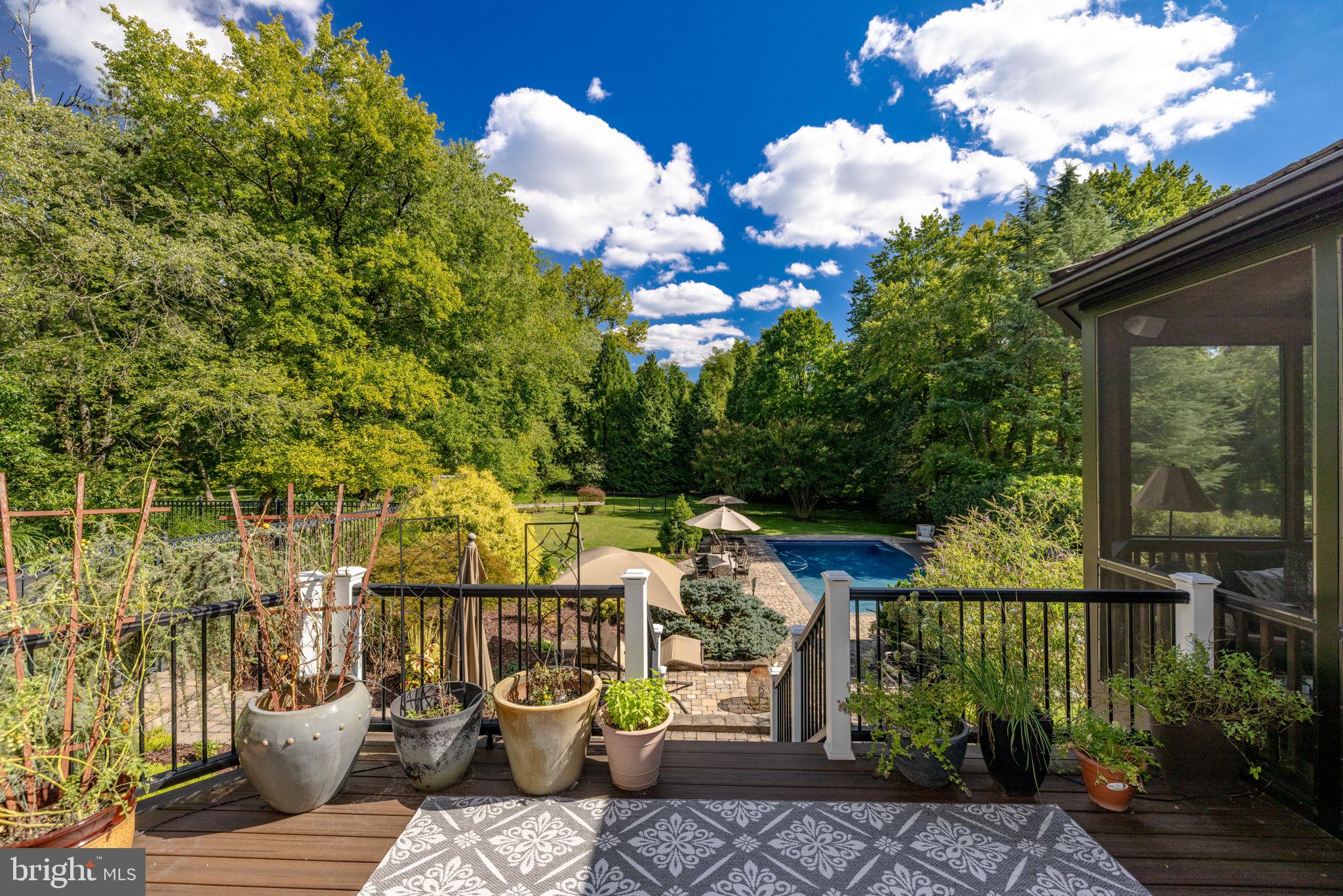 10011 Gary Road Potomac, MD 20854 - Photo 60 of 74 Spectacular Views through Great Room to Deck