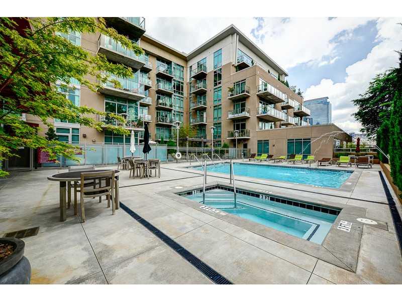Exterior Front. Stellar pool level w/ fountain, water features, large pool, hot tub, club/ media room, gym & grilling station!
