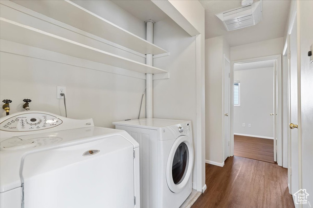 947 Canyon Road South, Unit 15 Ogden, UT 84404 - Photo 20 of 22 Laundry room featuring dark wood finished floors and washer and clothes dryer