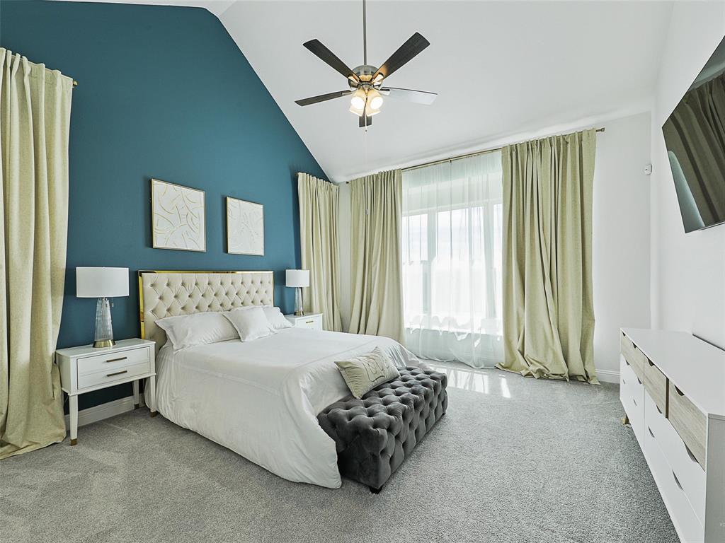 3141 Sunfish Street Prosper, TX 75078 - Photo 16 of 33 a bedroom with a bed and window