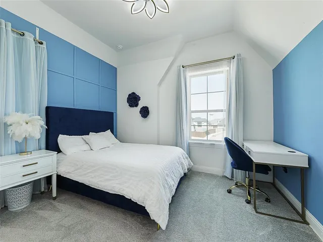 a view of livingroom with furniture and windows