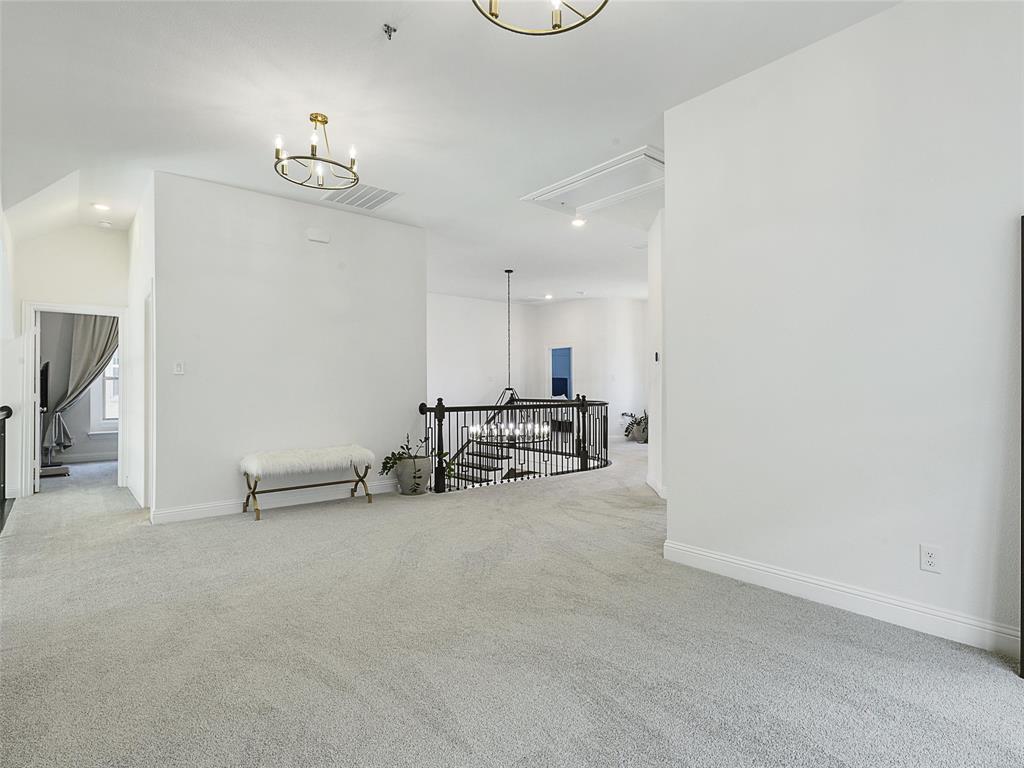 3141 Sunfish Street Prosper, TX 75078 - Photo 27 of 33 a view of a room with gym equipment