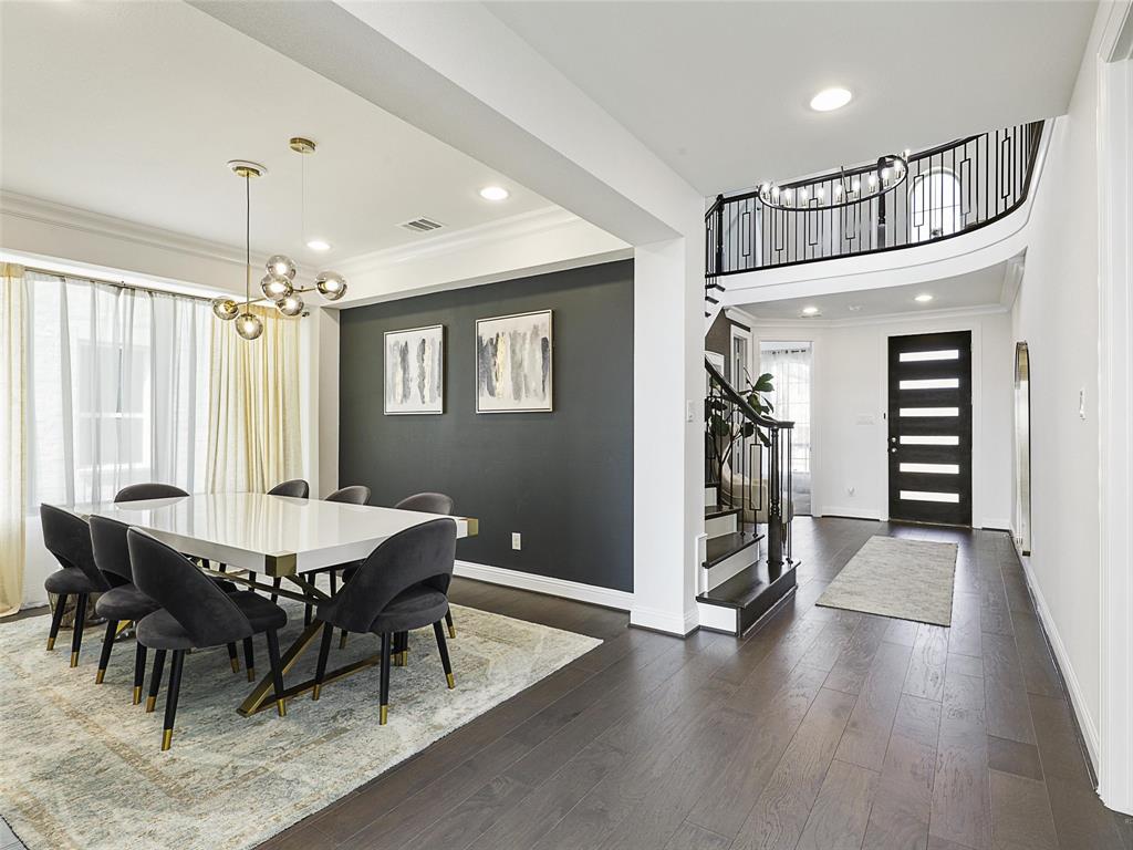 3141 Sunfish Street Prosper, TX 75078 - Photo 8 of 33 a dining room with furniture window and wooden floor