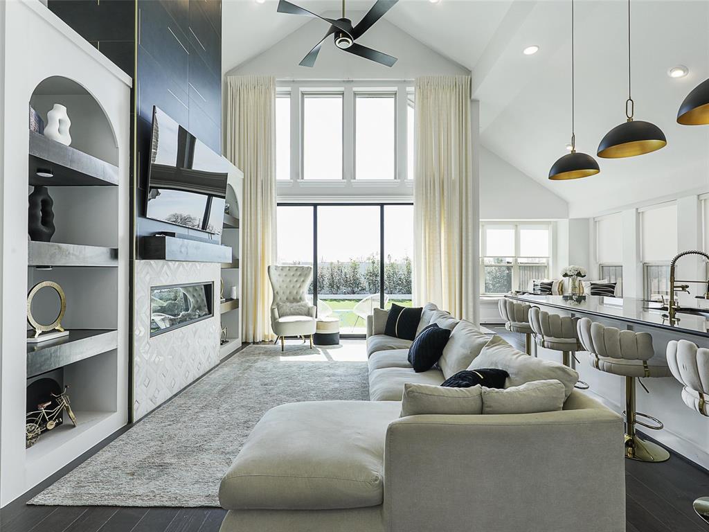 3141 Sunfish Street Prosper, TX 75078 - Photo 10 of 33 a living room with furniture and a large window
