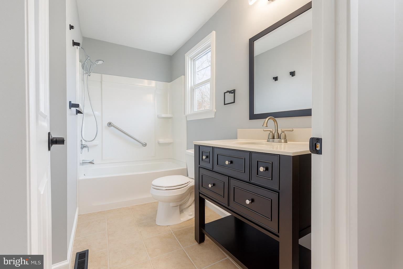 22 Clemson Road Cherry Hill, NJ 08034 - Photo 16 of 25 a bathroom with a sink a toilet and shower