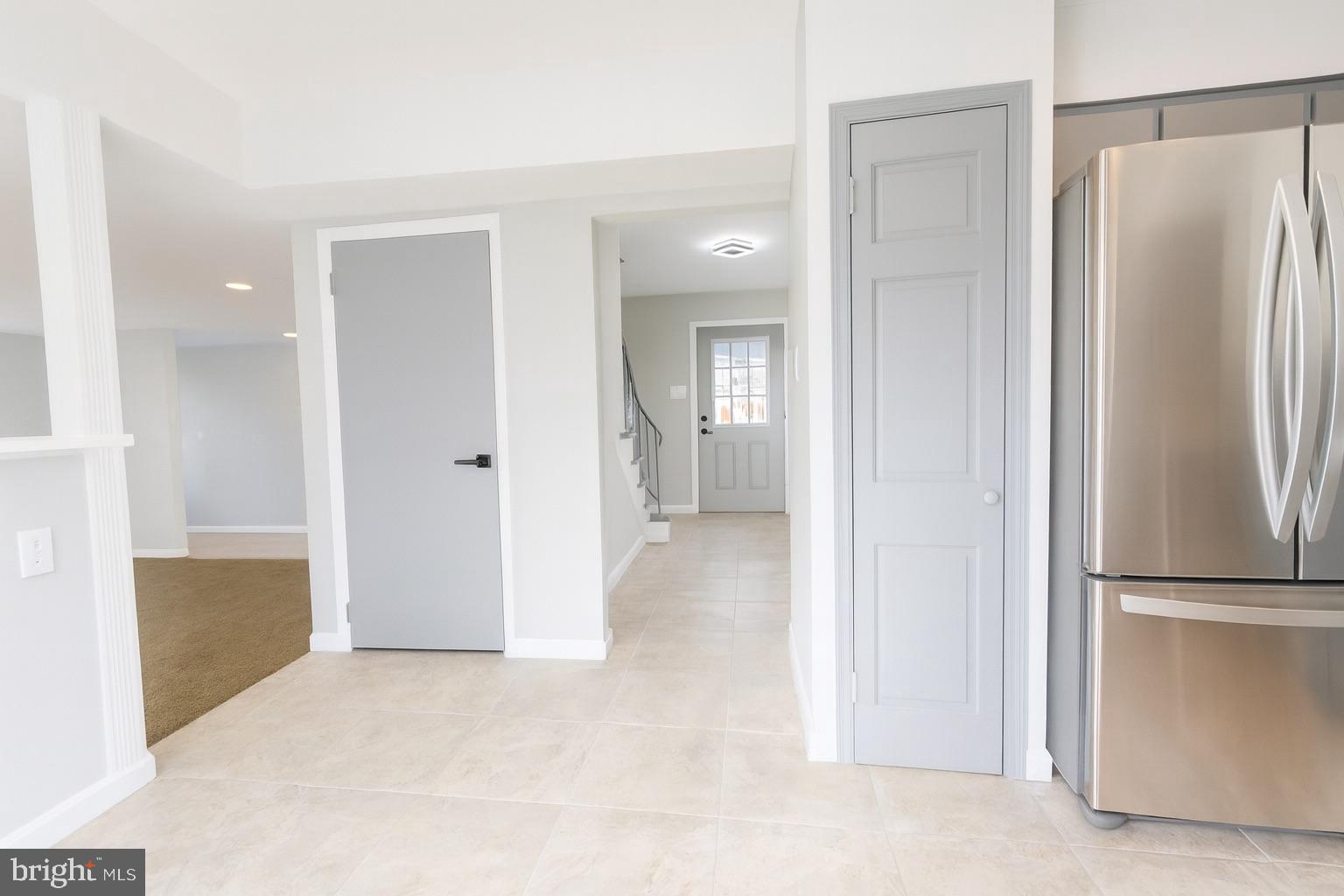 22 Clemson Road Cherry Hill, NJ 08034 - Photo 8 of 25 a view of a kitchen with a refrigerator and a sink