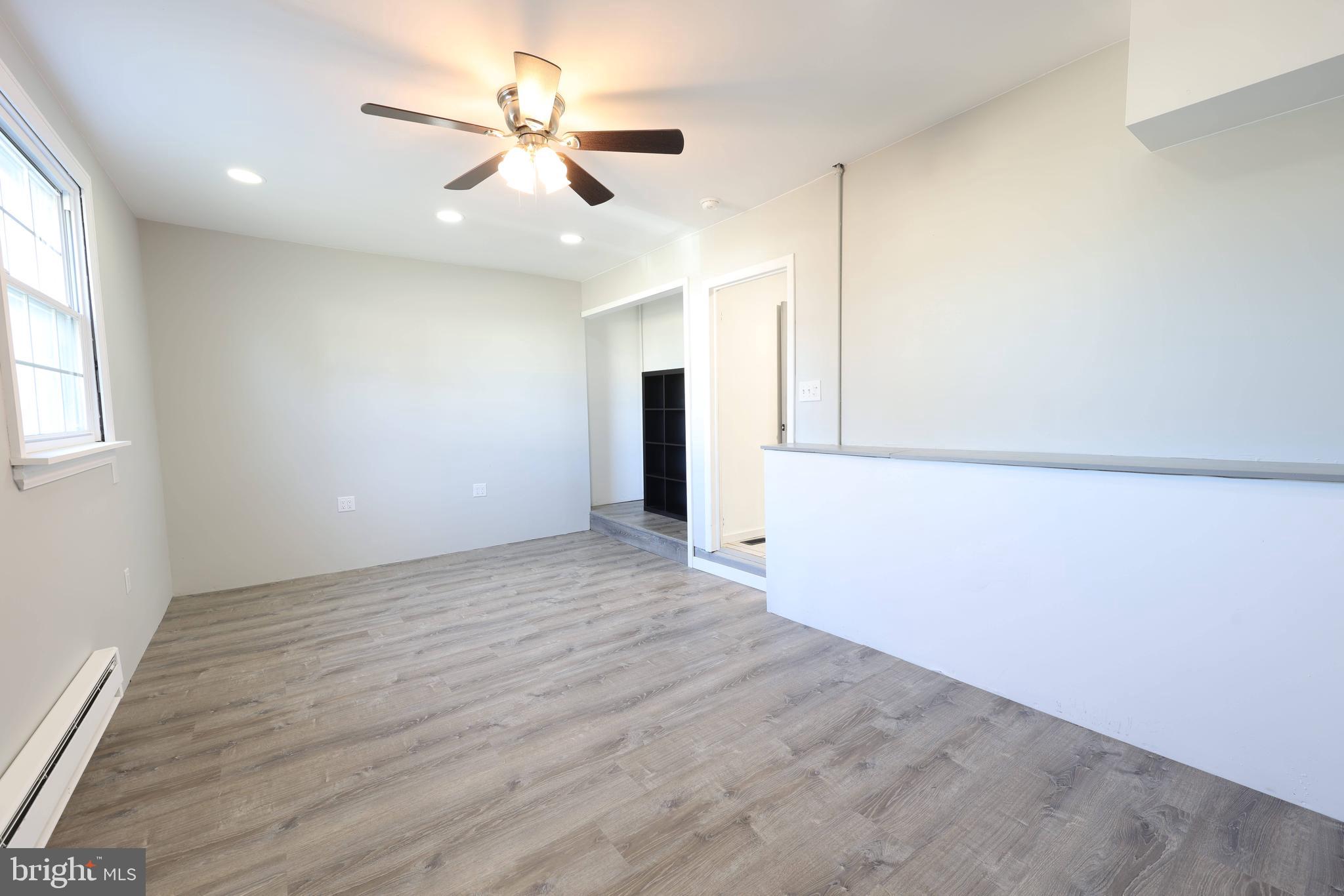22 Clemson Road Cherry Hill, NJ 08034 - Photo 10 of 25 wooden floor in an empty room with a window
