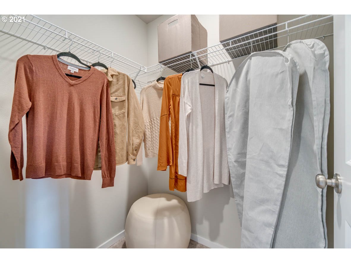 15784 Northwest Brugger Road Portland, OR 97229 - Photo 19 of 21 a view of walk in closet with clothes