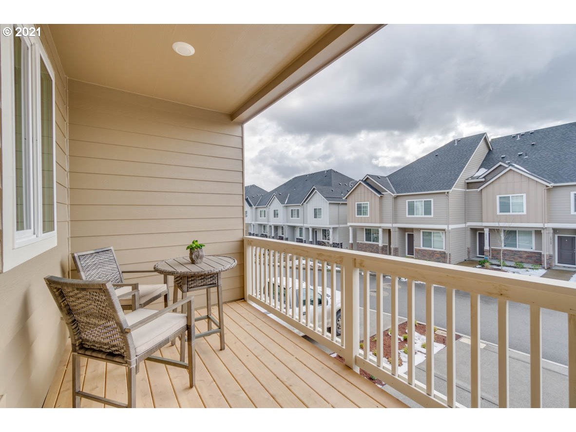 15784 Northwest Brugger Road Portland, OR 97229 - Photo 20 of 21 a view of a chairs and table on the deck