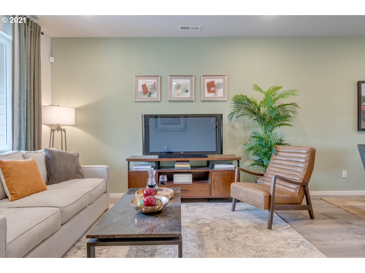 15784 Northwest Brugger Road Portland, OR 97229 - Photo 4 of 21 a living room with furniture and a couch