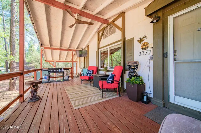 a view of a house with outdoor seating