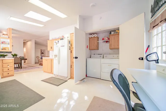 a view of a kitchen with furniture and a kitchen