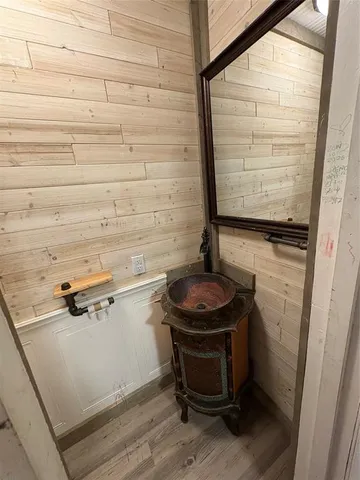 a bathroom with a toilet and a sink