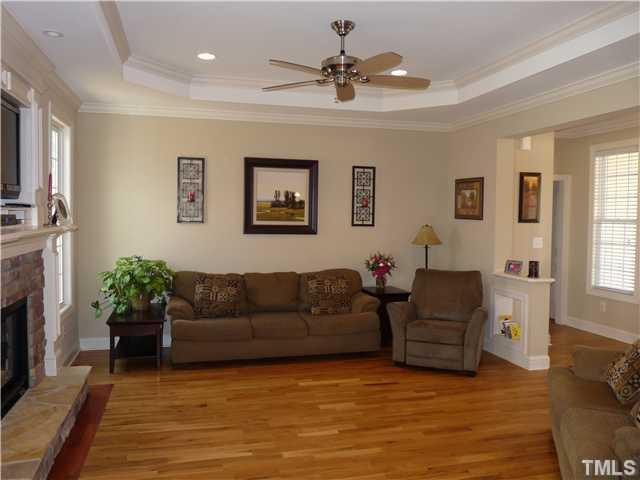 220 Weaver Ridge Road Rougemont, NC 27572 - Photo 3 of 12 a living room with furniture and a fireplace