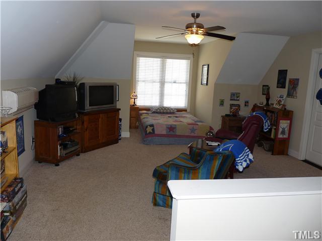 220 Weaver Ridge Road Rougemont, NC 27572 - Photo 10 of 12 a living room with furniture and a flat screen tv