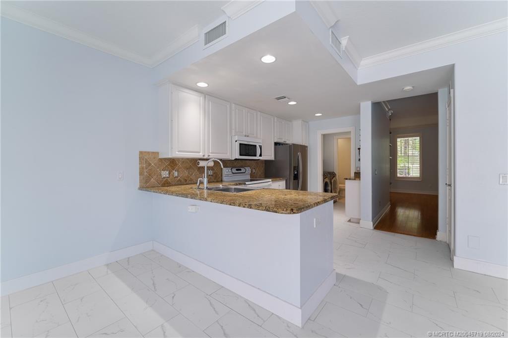 115 Andover Drive Jupiter, FL 33458 - Photo 8 of 36