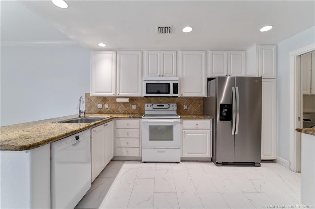 115 Andover Drive Jupiter, FL 33458 - Photo 10 of 36