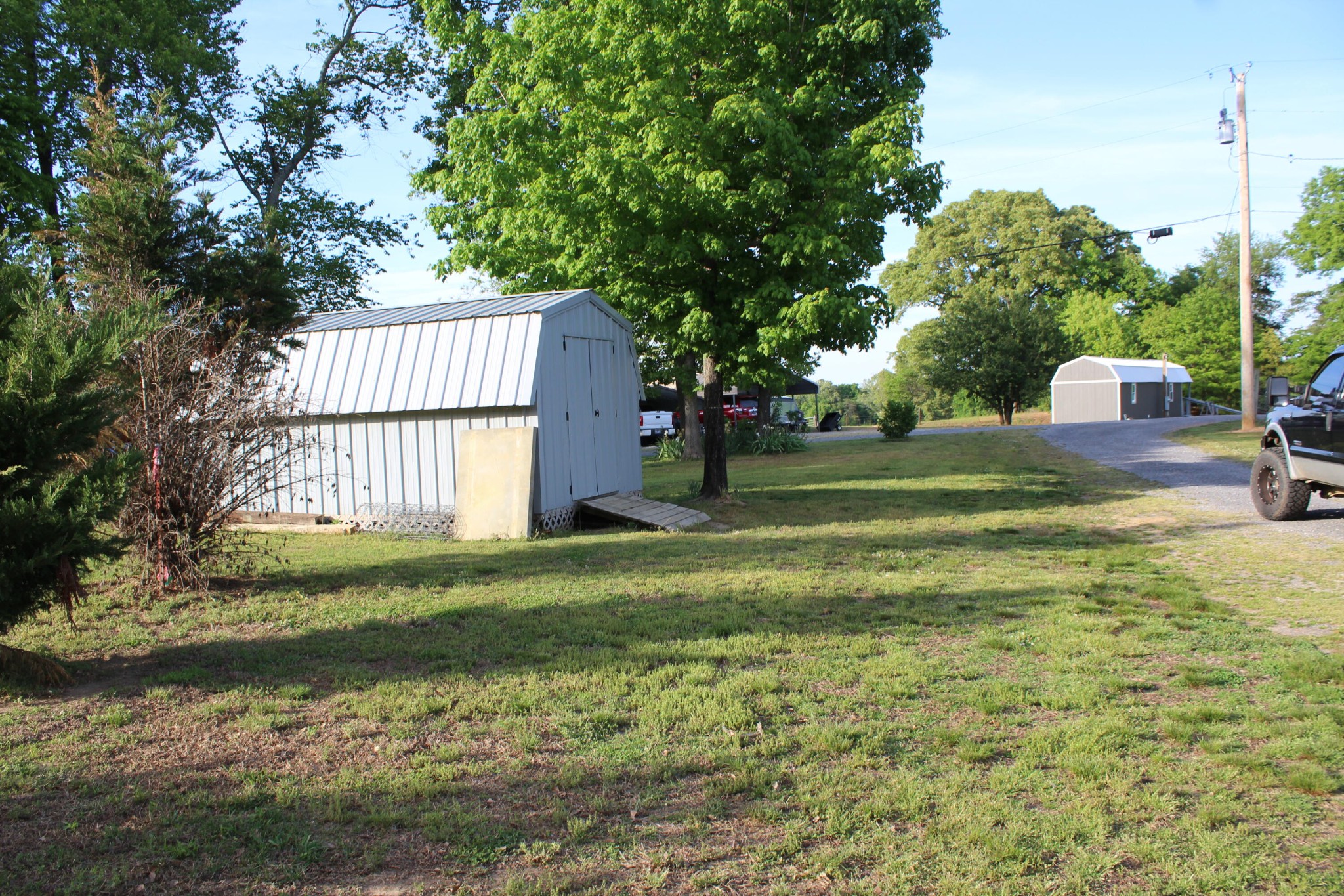 658 Stone Road Benton, TN 37307 - Photo 25 of 30 a view of a tiny house with a yard