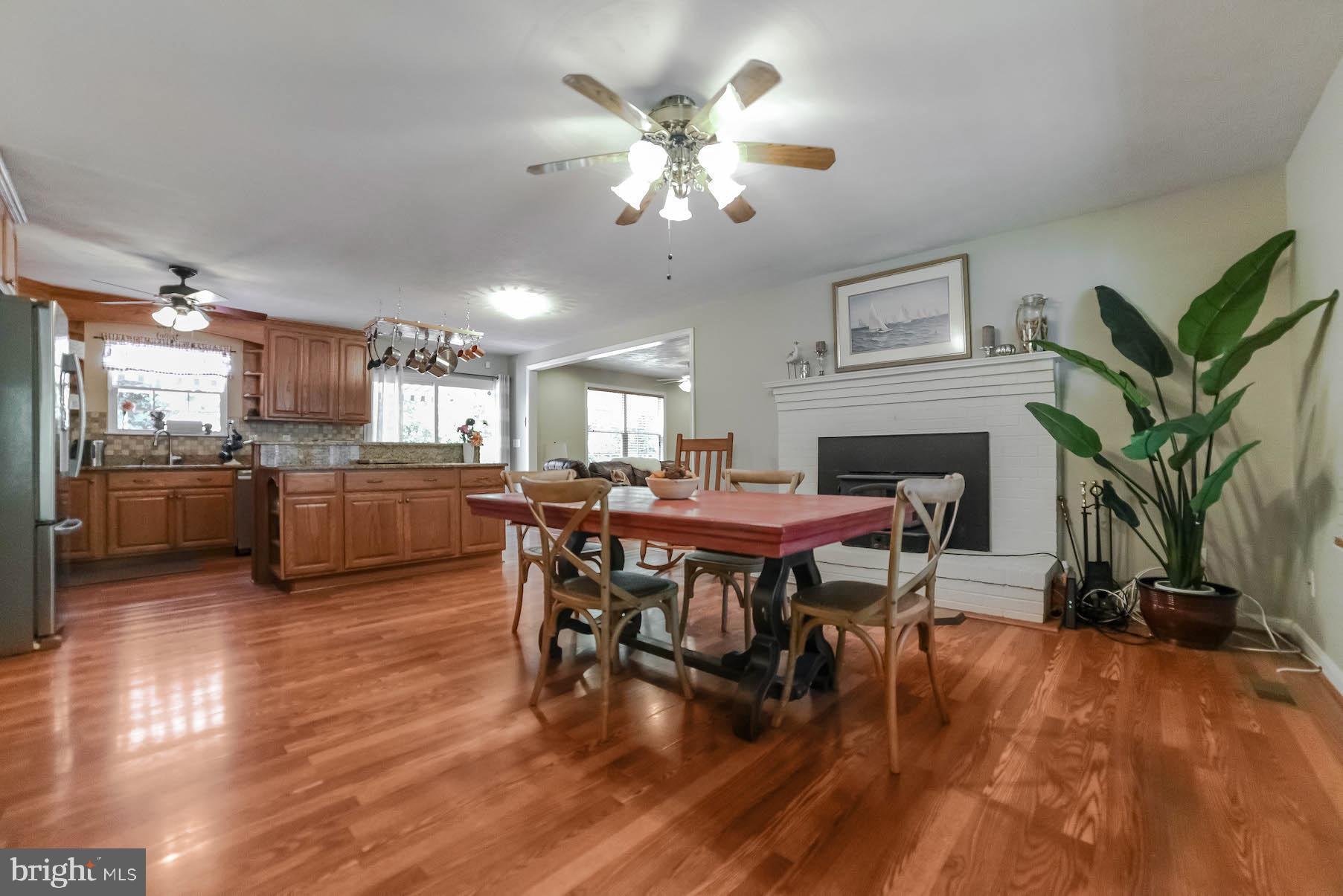 25855 Ricky Drive Hollywood, MD 20636 - Photo 2 of 49 Gleaming laminate floors greet you