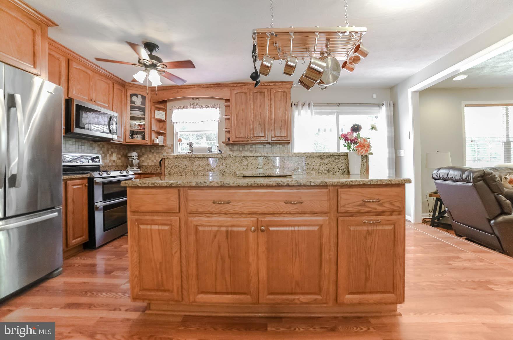 25855 Ricky Drive Hollywood, MD 20636 - Photo 18 of 49 Island w/ extra storage and breakfast bar