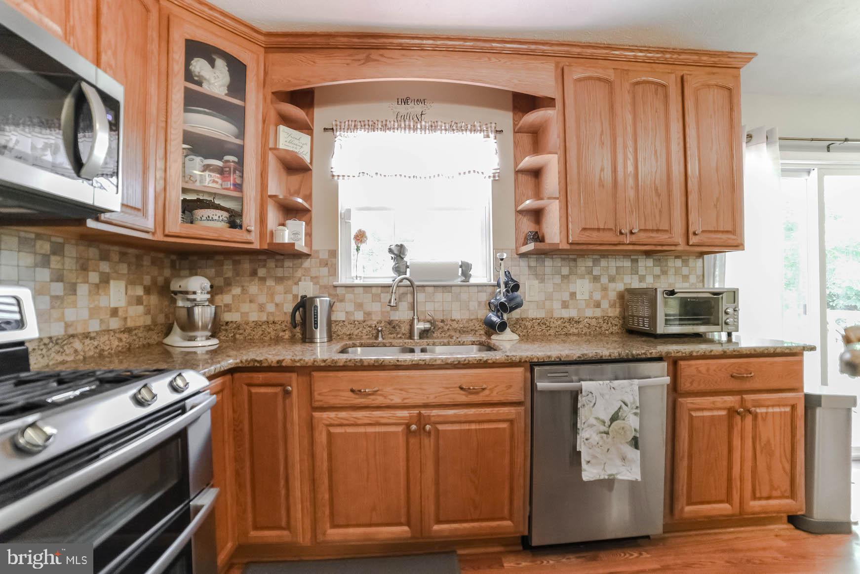 25855 Ricky Drive Hollywood, MD 20636 - Photo 19 of 49 Tile backsplash, sliders out to deck