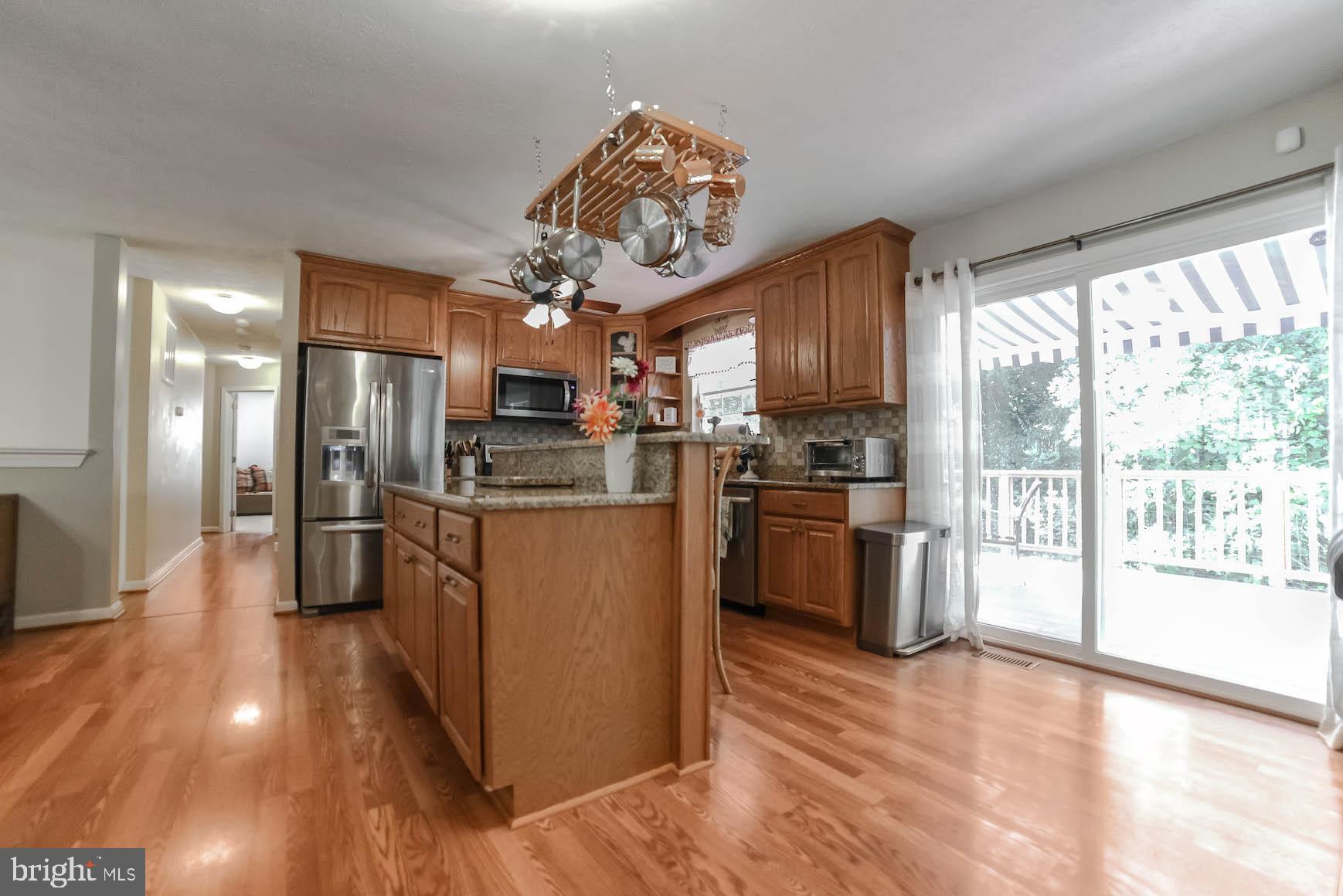 25855 Ricky Drive Hollywood, MD 20636 - Photo 3 of 49 Open kitchen, dining and family room