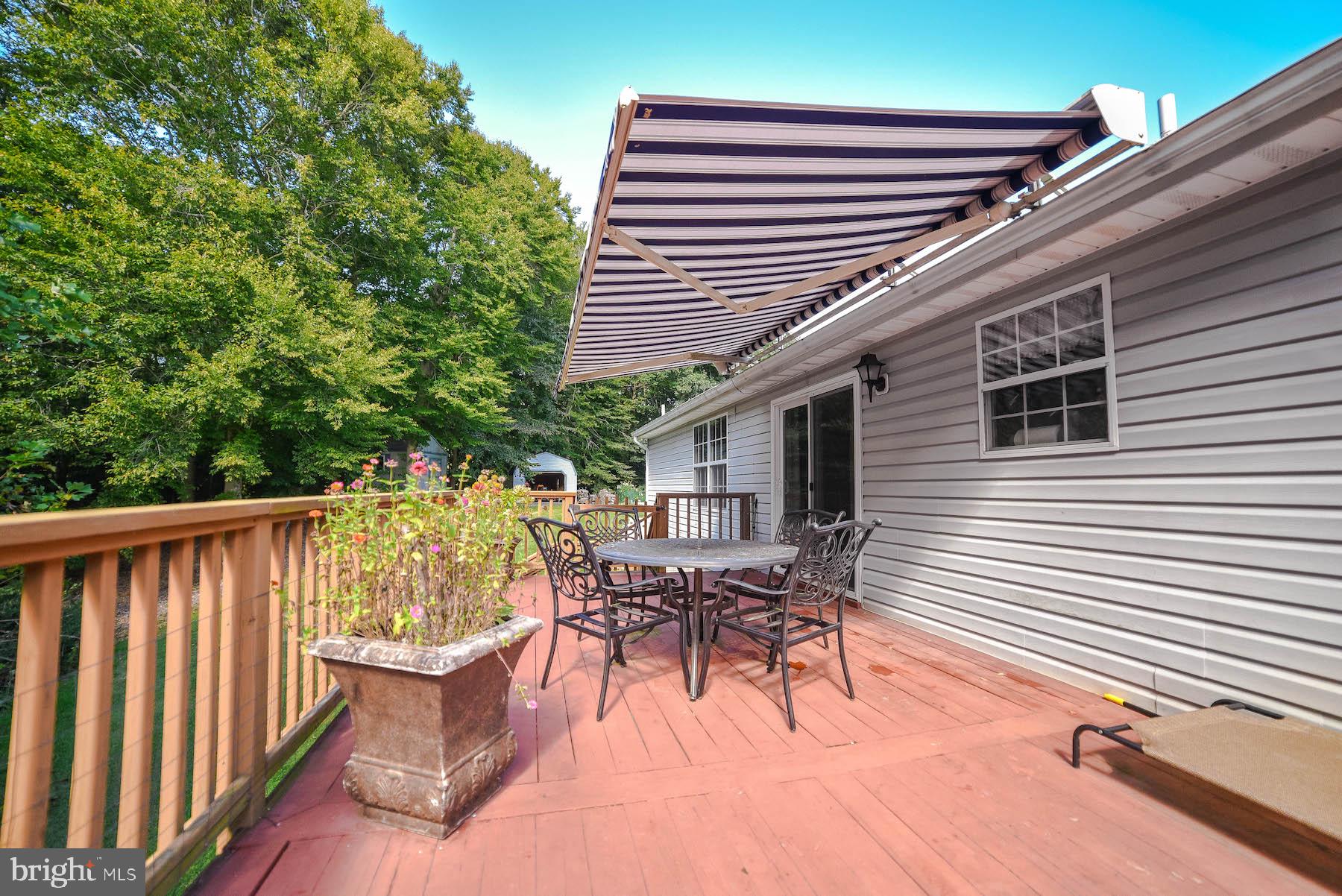 25855 Ricky Drive Hollywood, MD 20636 - Photo 4 of 49 Huge rear deck backs to trees