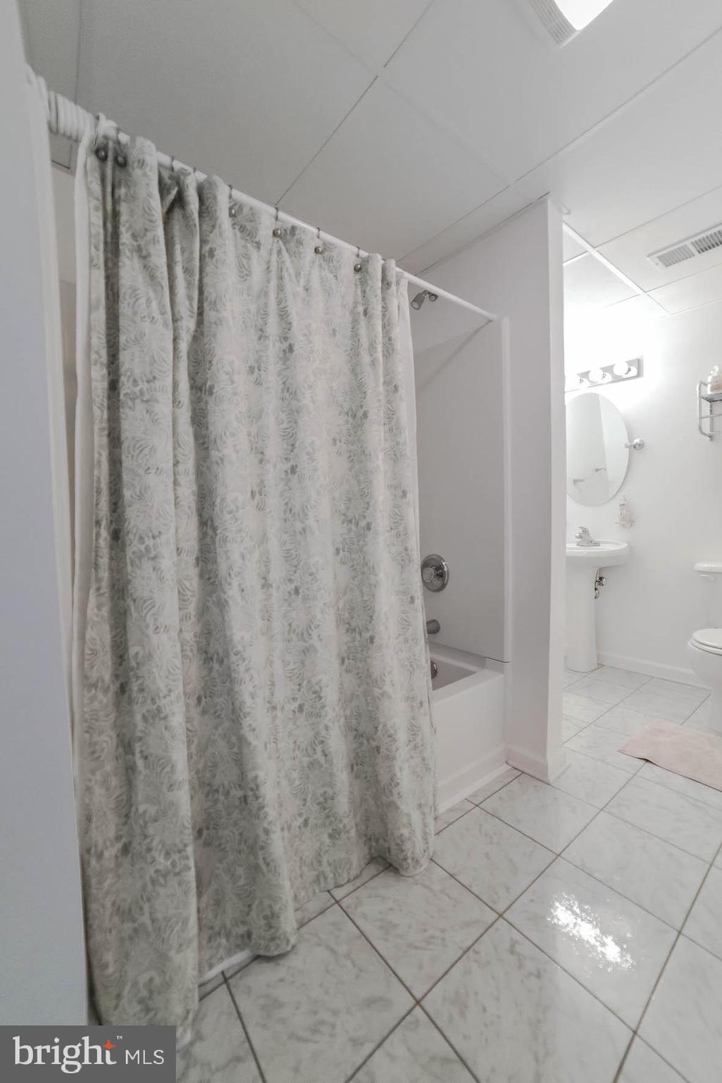25855 Ricky Drive Hollywood, MD 20636 - Photo 43 of 49 Tile floors and tub/shower