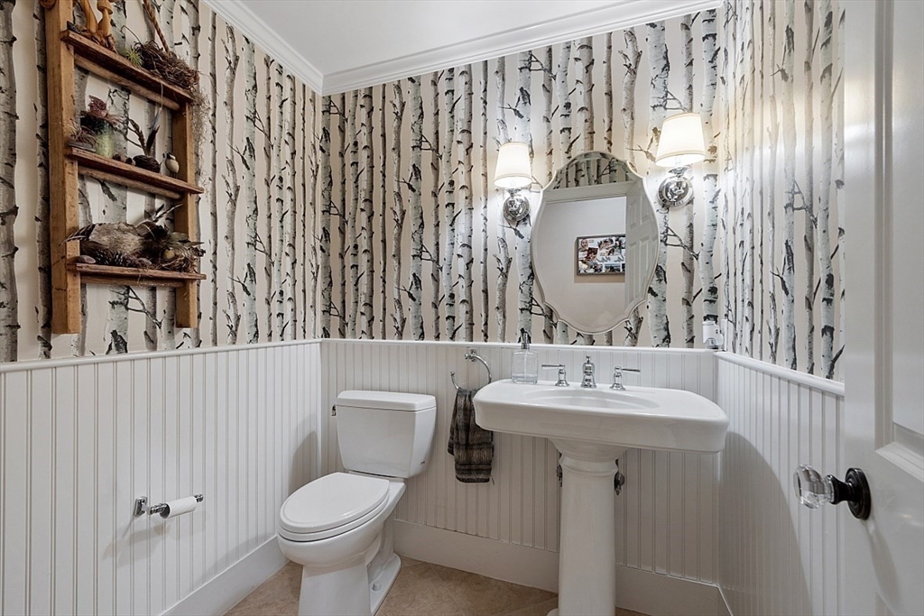 6 Billadell Road Stow, MA 01775 - Photo 14 of 42 a bathroom with a toilet sink and mirror