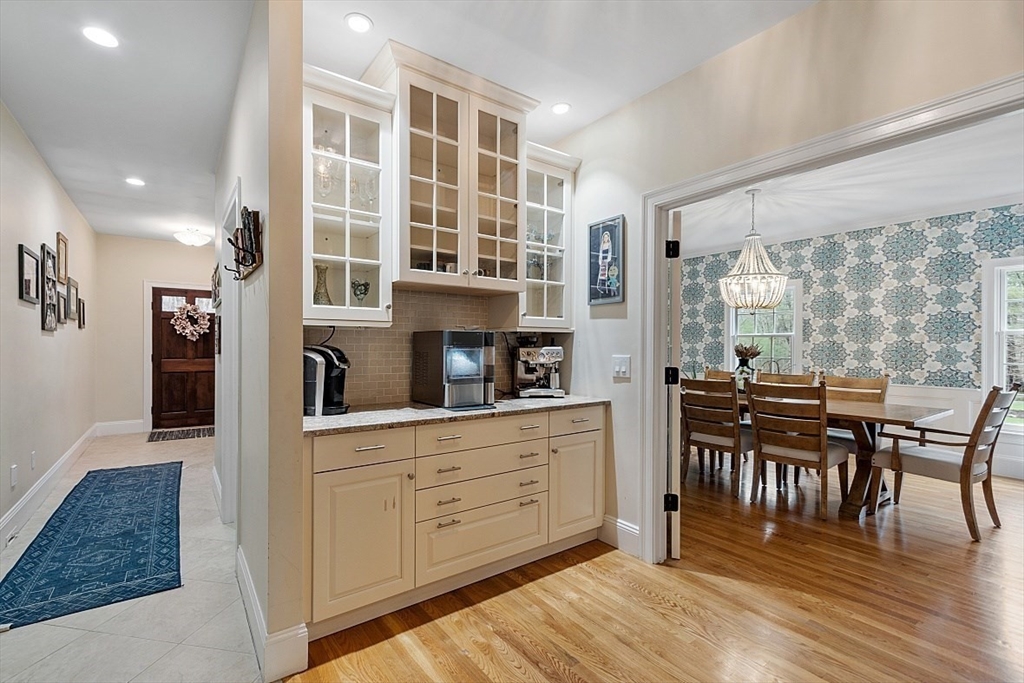 6 Billadell Road Stow, MA 01775 - Photo 10 of 42 a open kitchen with granite countertop a stove and chairs