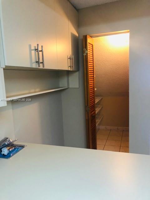 2212 West 74th Street, Unit 10128 Hialeah, FL 33016 - Photo 6 of 12 a view of cupboard