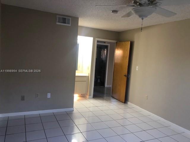 2212 West 74th Street, Unit 10128 Hialeah, FL 33016 - Photo 8 of 12 a view of an empty room