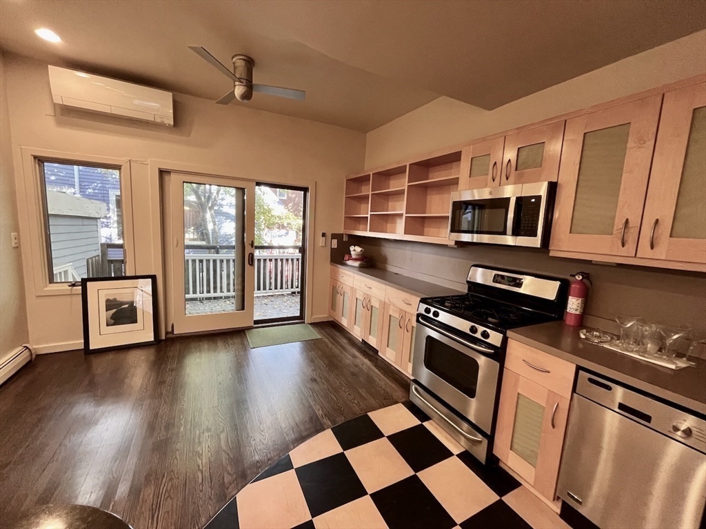 a kitchen with stainless steel appliances granite countertop a stove and a sink