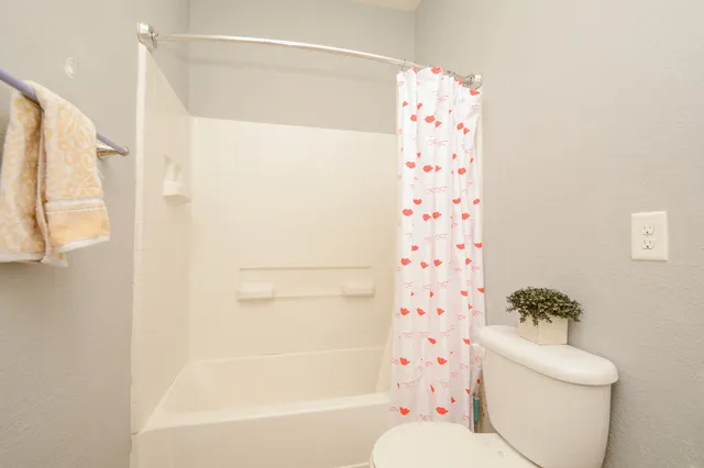 a kitchen with stainless steel appliances granite countertop a stove a microwave and cabinets