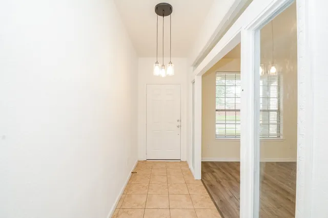 a view of kitchen and dining room with furniture wooden floor