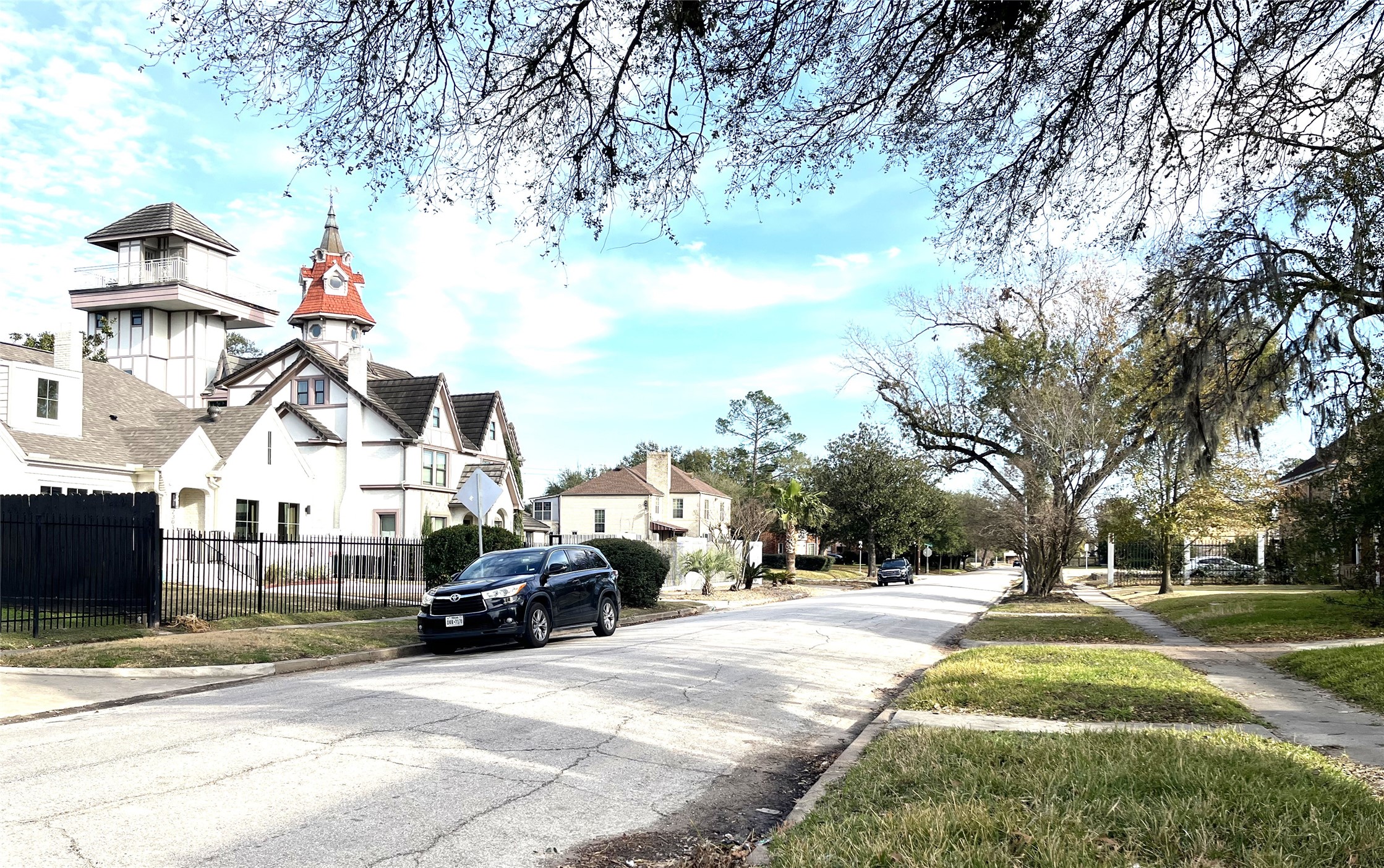 2209 Wichita Street Houston, TX 77004 - Photo 7 of 11 a view of road with card parked on side and road